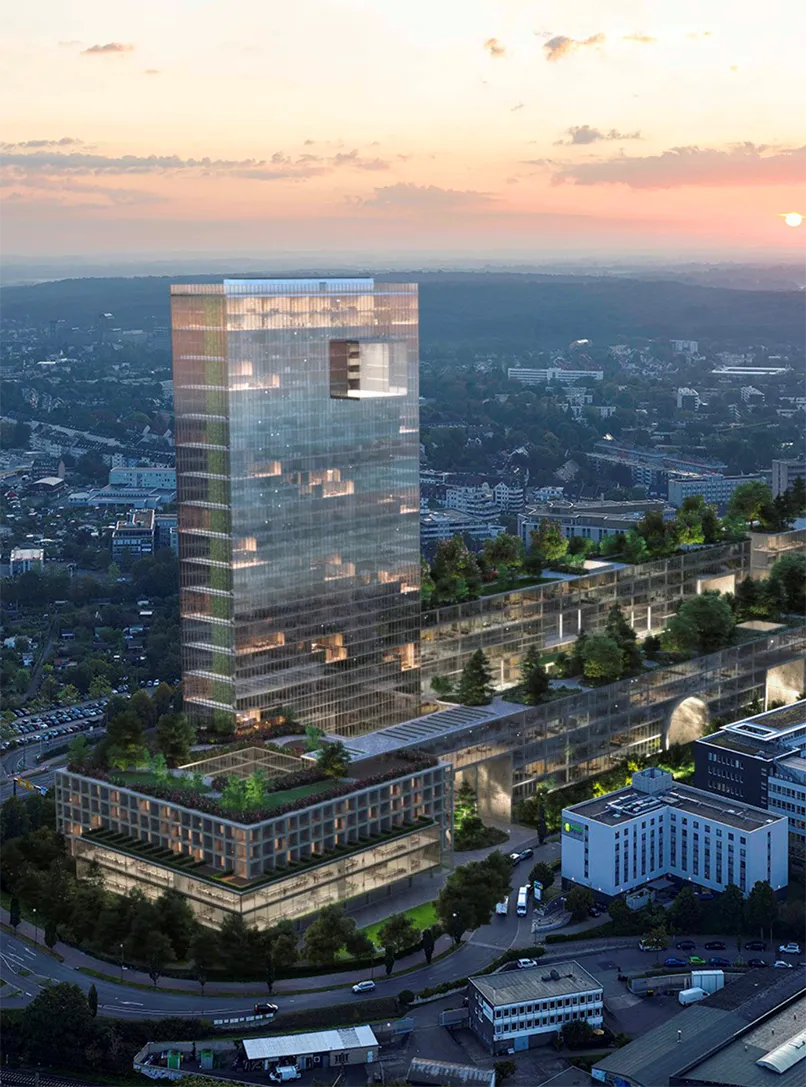 Luftaufnahme der Stadt Düsseldorf zur goldenen Stunde mit dem neuen TACT Campus im Mittelpunkt